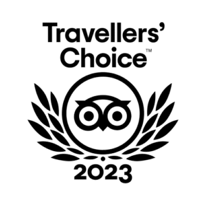 Black and white "Travellers' Choice 2023" award logo featuring an owl emblem surrounded by laurel leaves.