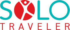 Solo Traveler logo featuring the words 'Solo Traveler' with a stylized 'O' representing a person with a red circle and turquoise lines.